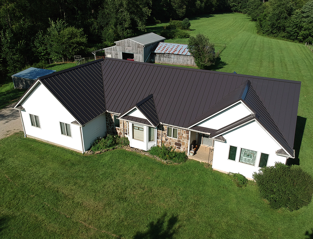 Standing seam metal roof installed on a ranch-style home in Ohio