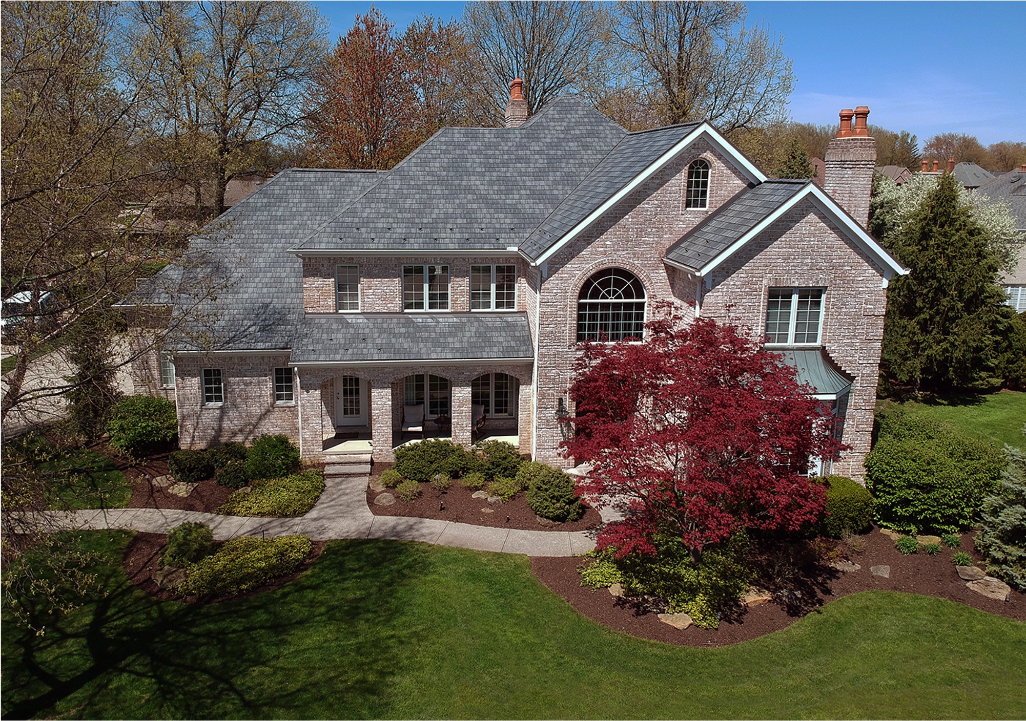 Standing seam metal roof installed on a ranch-style home in Ohio